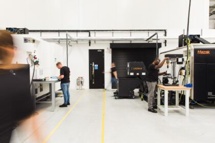 Engineer using CAM software to demonstrate faster CAM programming techniques