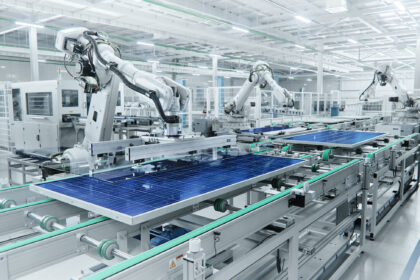 AI in sheet metal automation with a robotic arm positioning sheet metal on an advanced press brake in a clean white smart factory.