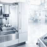 UK manufacturers AI adoption shown through a modern CNC machining centre in a bright, clean factory environment