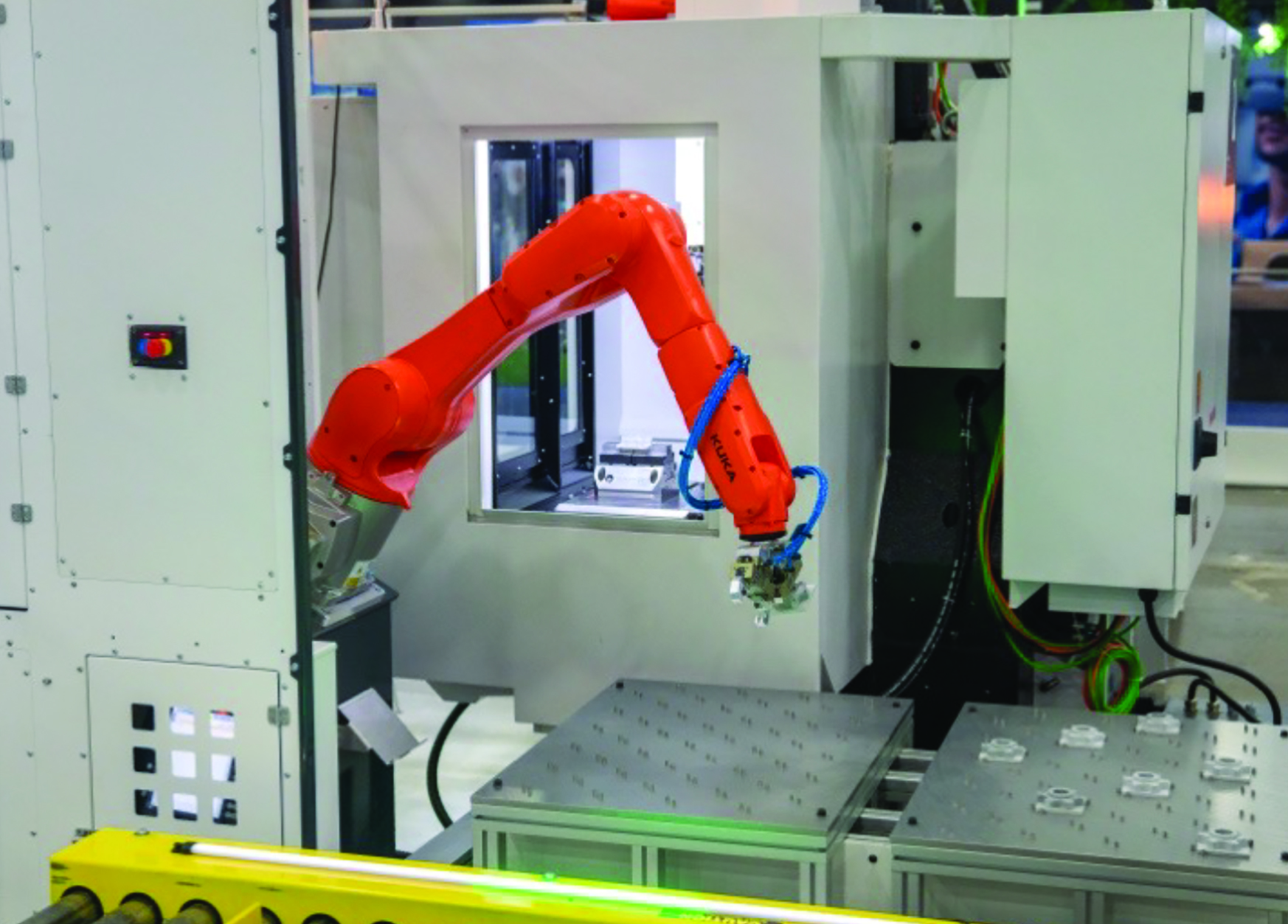 AI machine tool automation integrating Siemens SINUMERIK CNC with KUKA robot on a SYIL machine tool