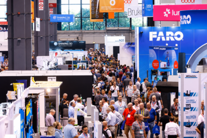 IMTS 2026 industrial AI trade show floor with manufacturers exploring AI CNC technology, CAM software, machine tool automation, metrology systems and smart manufacturing solutions