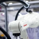 Kawasaki Physical AI Robot 2026 RL030N industrial robot arm demonstrating adaptive factory automation, robotic inspection and AI-controlled production handling at Automate 2026.