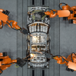 KUKA AMP Physical AI platform using industrial robots to weld an automotive body inside a North American car factory