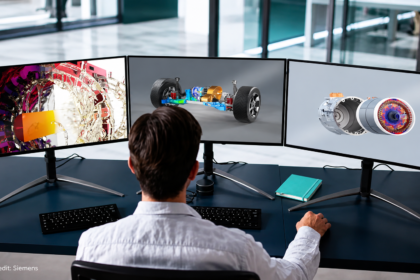 Engineer using Siemens AI-Powered Simcenter simulation software across three monitors to analyse vehicle chassis, motor and fluid dynamics designs before manufacturing