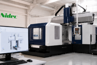 Nidec NC Twin digital twin platform for CNC machining, showing Nidec Machine Tool MVR Series double-column machining centre with virtual NC programme simulation for machine operation, cycle time verification, interference checking and surface quality prediction