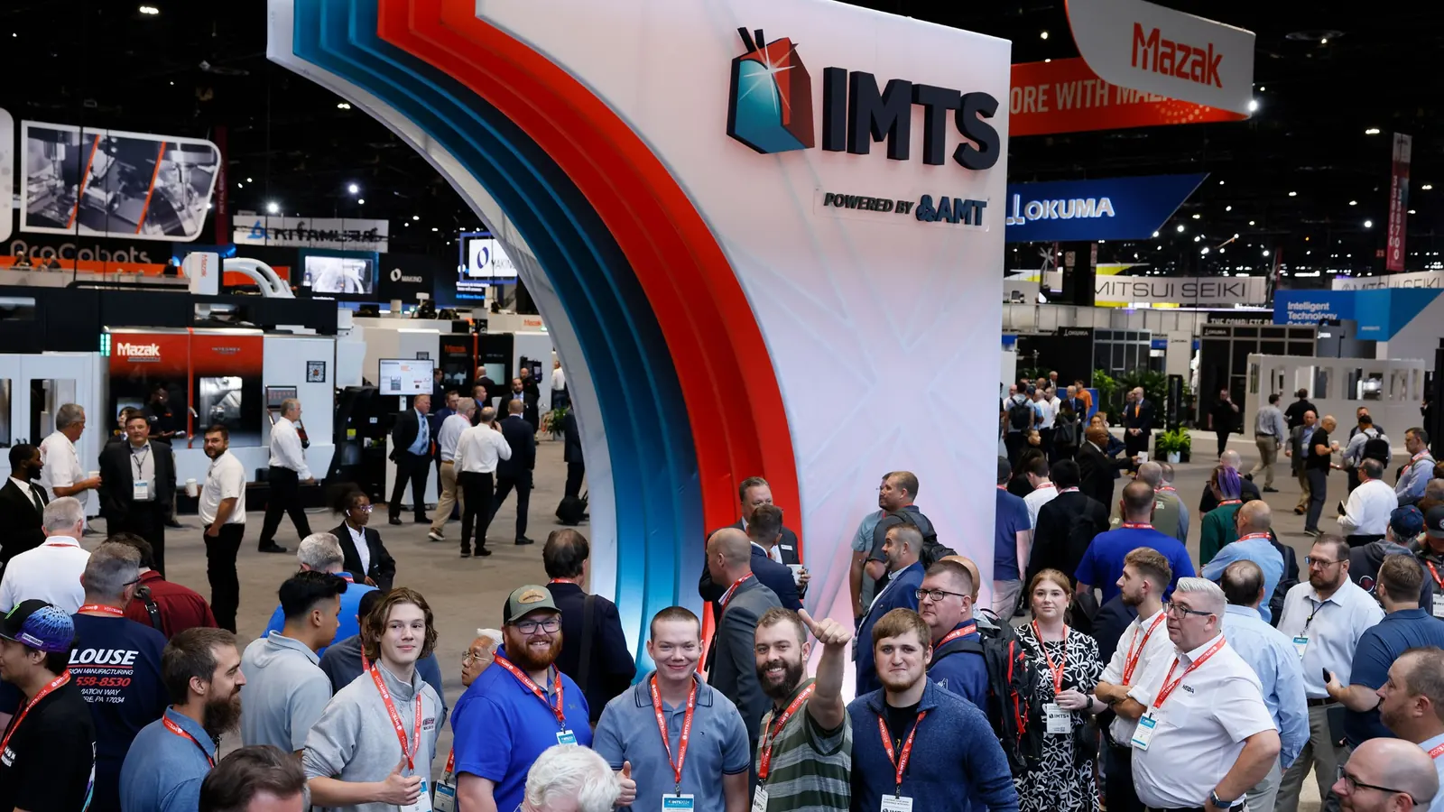 IMTS 2026 industrial AI exhibition at McCormick Place with manufacturing professionals, CNC machine tool stands and automation technology on the show floor