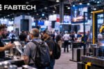 FABTECH 2026 exhibition show floor featuring the FABTECH logo, visitors, industrial automation equipment and a robotic welding demonstration.
